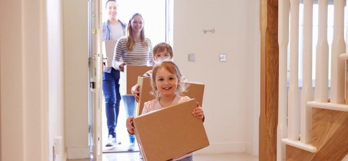 Family-Moving-into-a-New-Home-Realtor-1-e1563306651180-1500x609