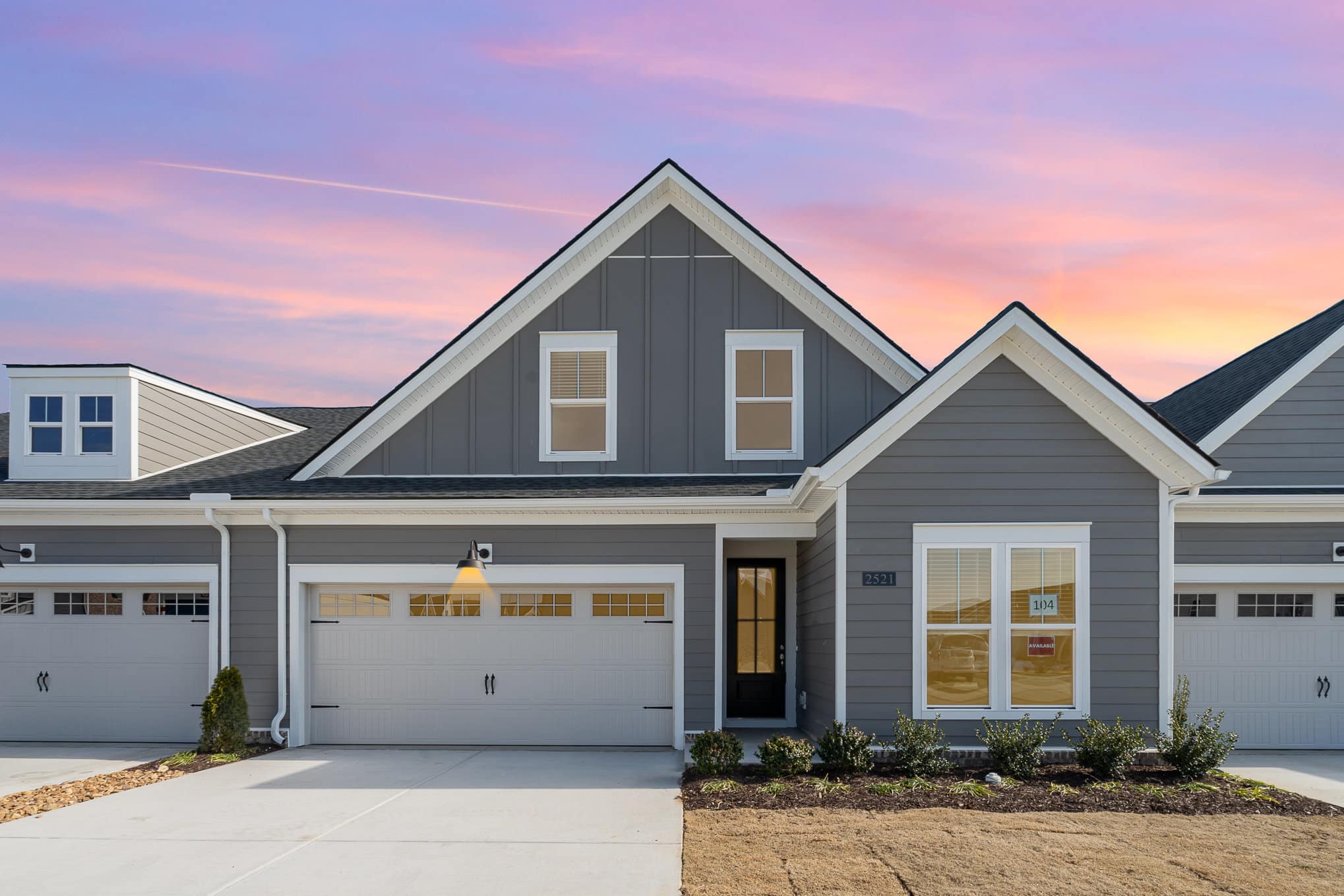 Gray cambridge style home built by patterson company