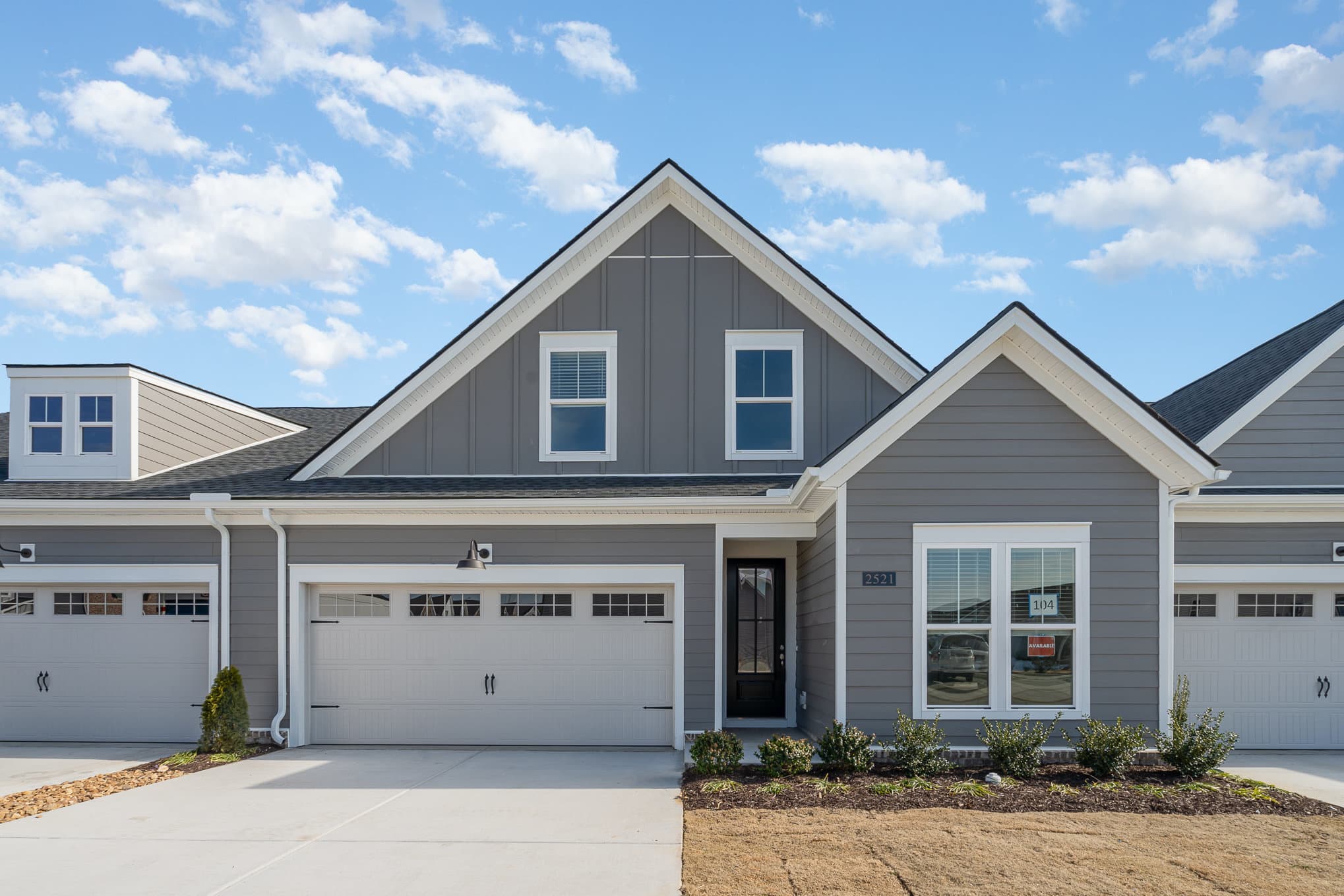 A gray cambridge home built by patterson company
