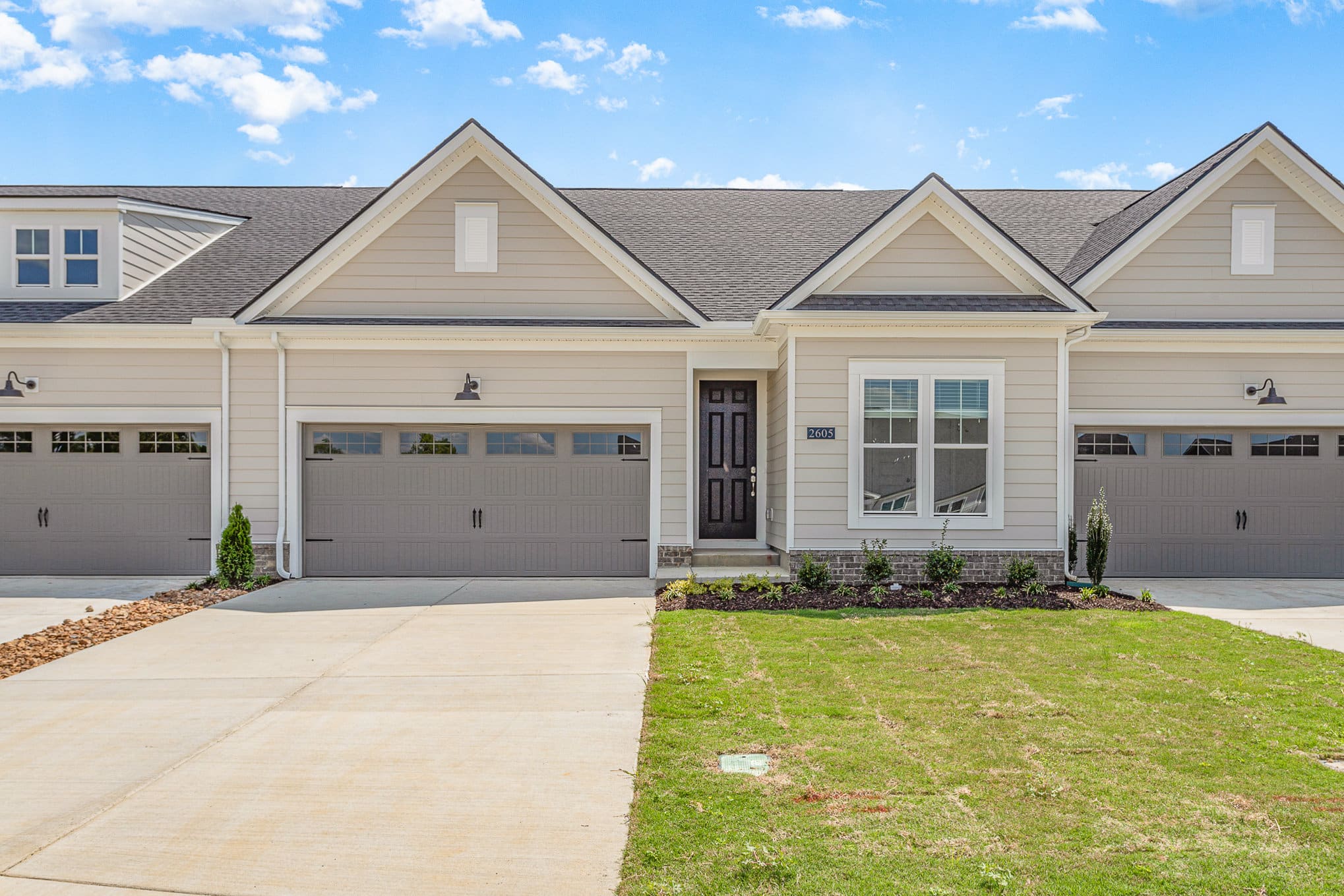 Front view of a cambridge style home by Patterson Company