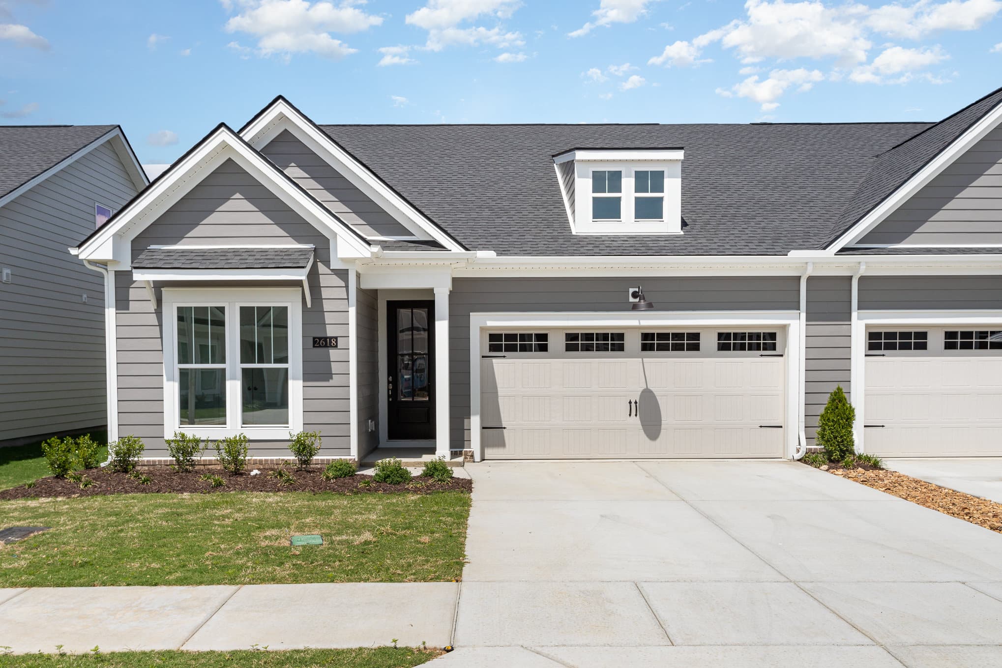 A light gray cambridge home built by patterson company