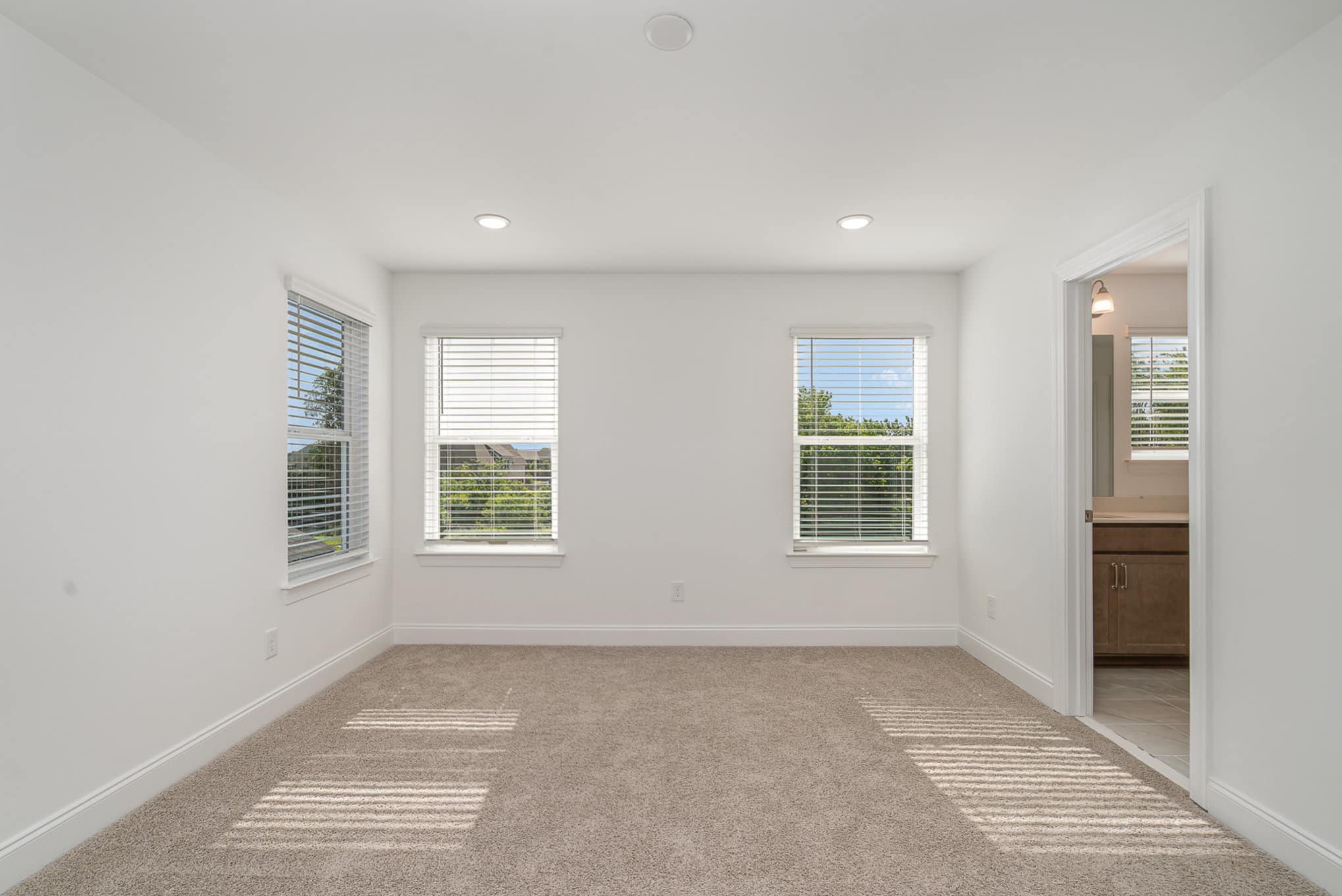 A bedroom in a home built by patterson company