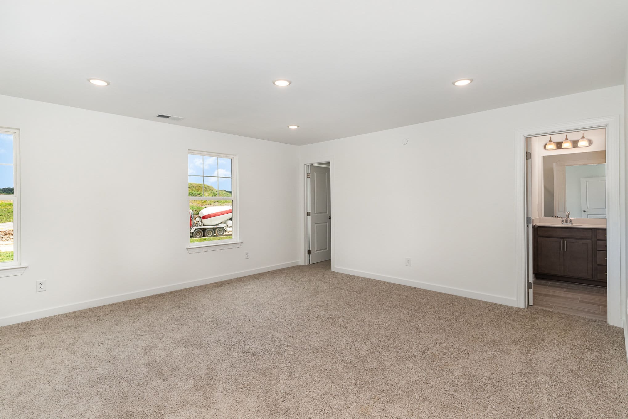 A bedroom in a home built with Patterson company