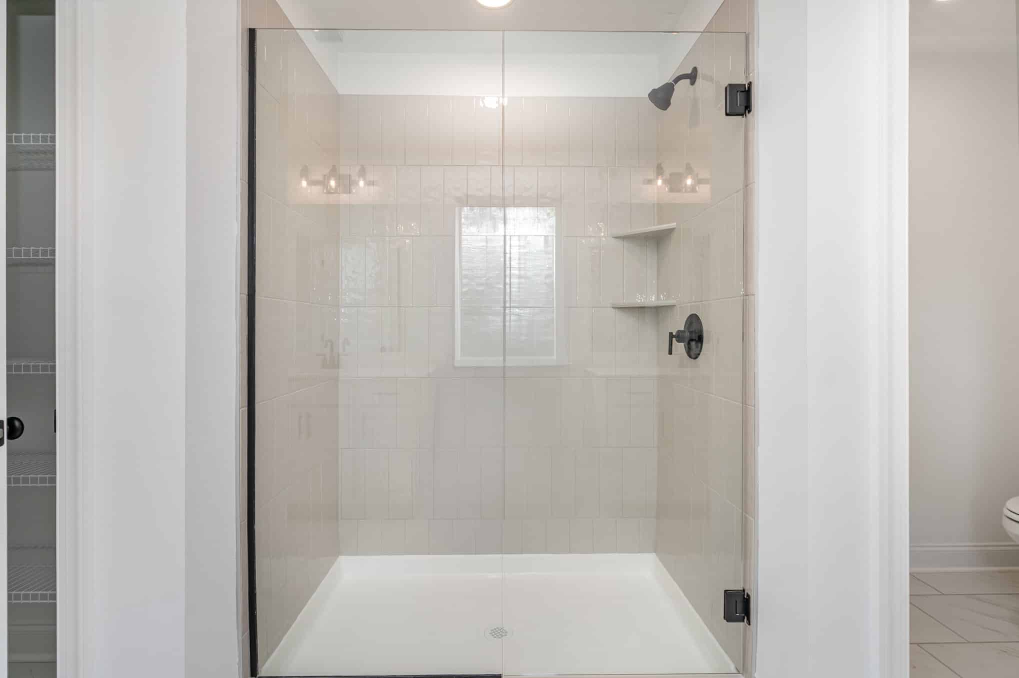 tiled walk in shower in powell series home