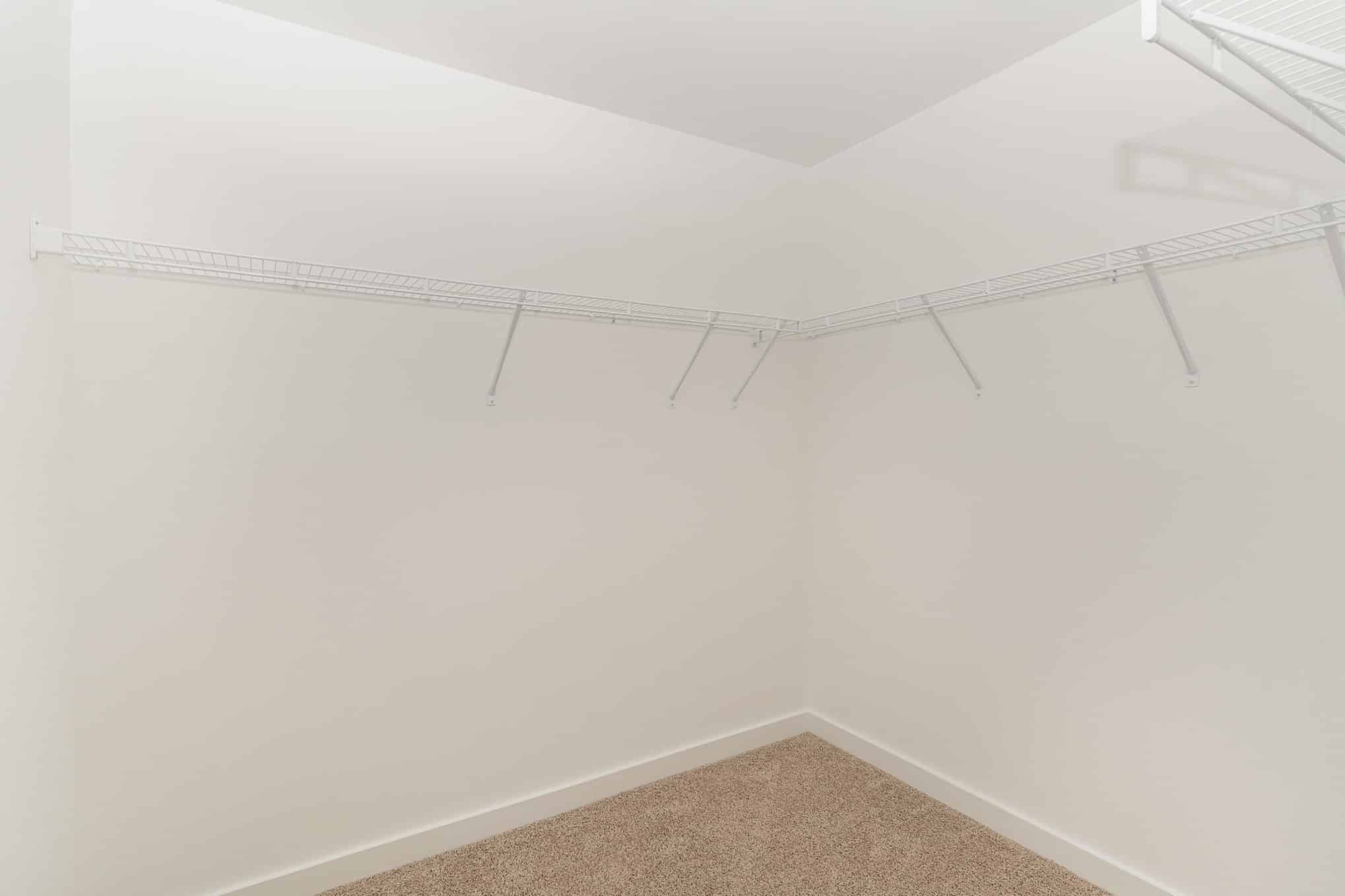 A closet in a somerville home built by patterson company