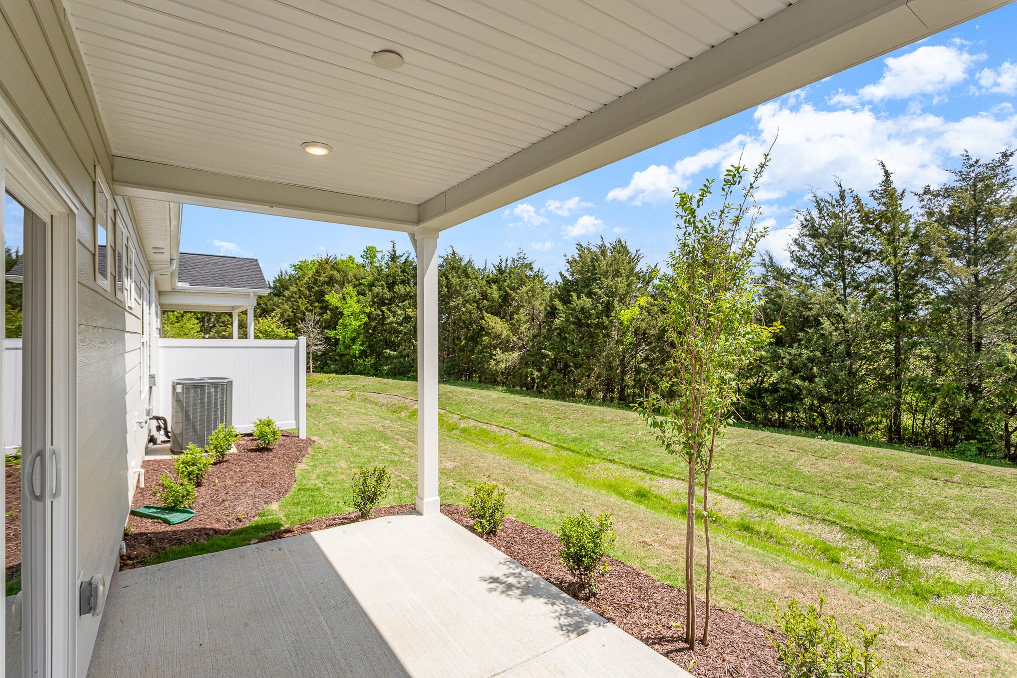 A backyard patio area in a home built by patterson company