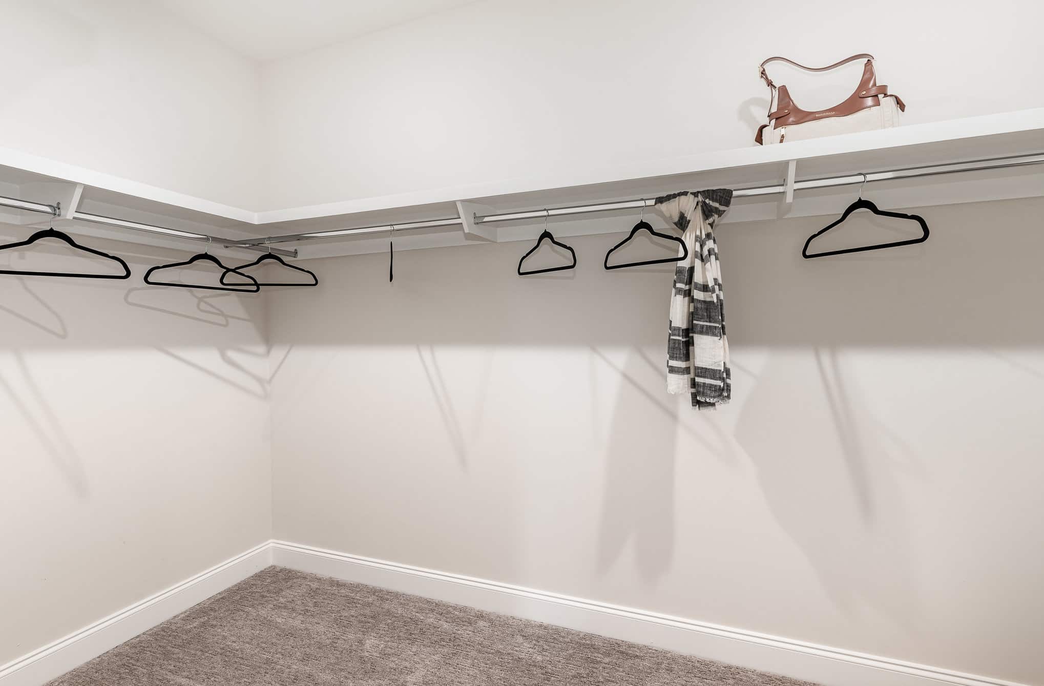 A closet space in a home built by patterson company
