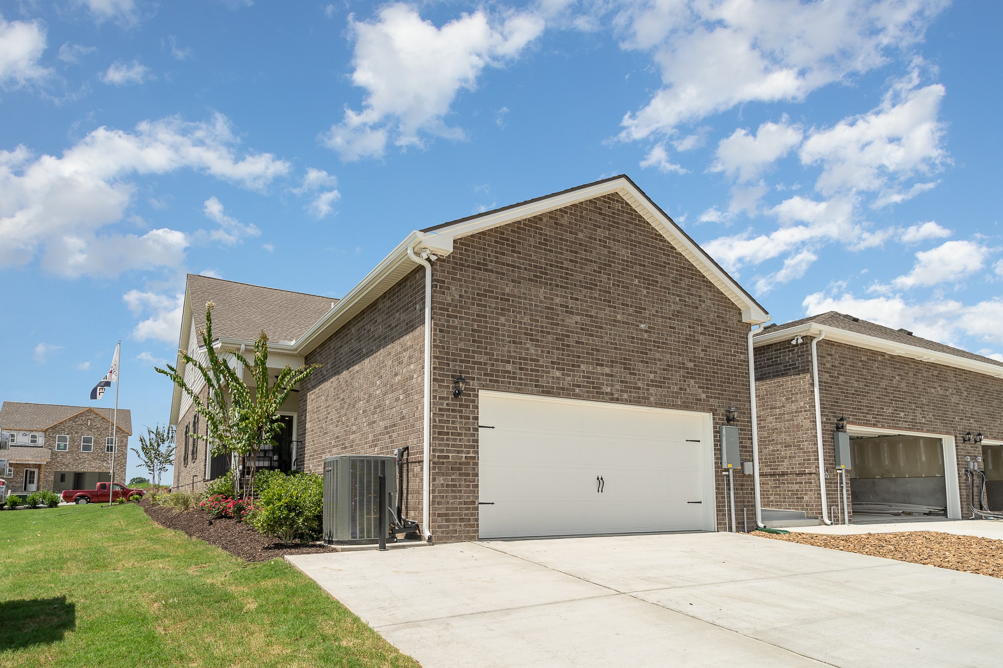 A two car garage at a side angle