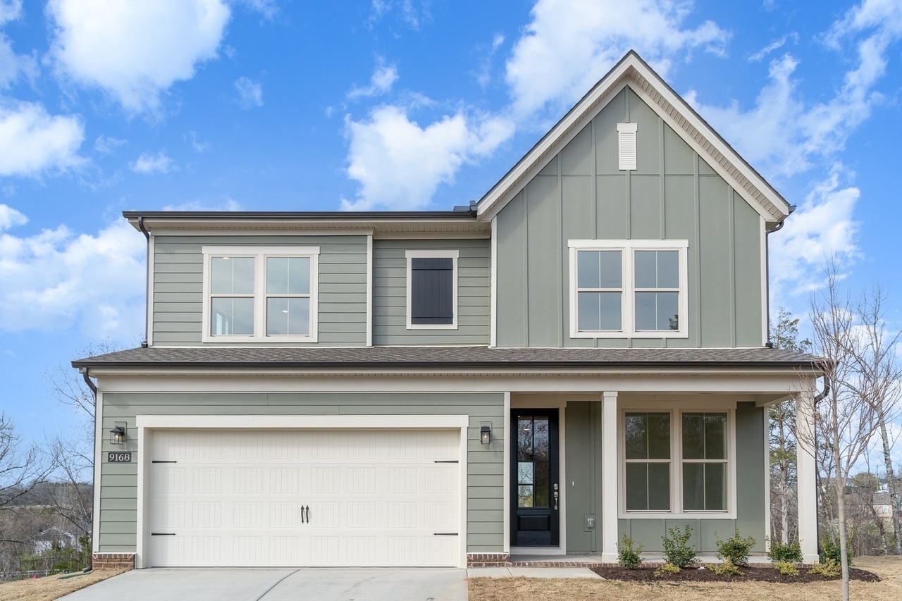 A light green home built by patterson company