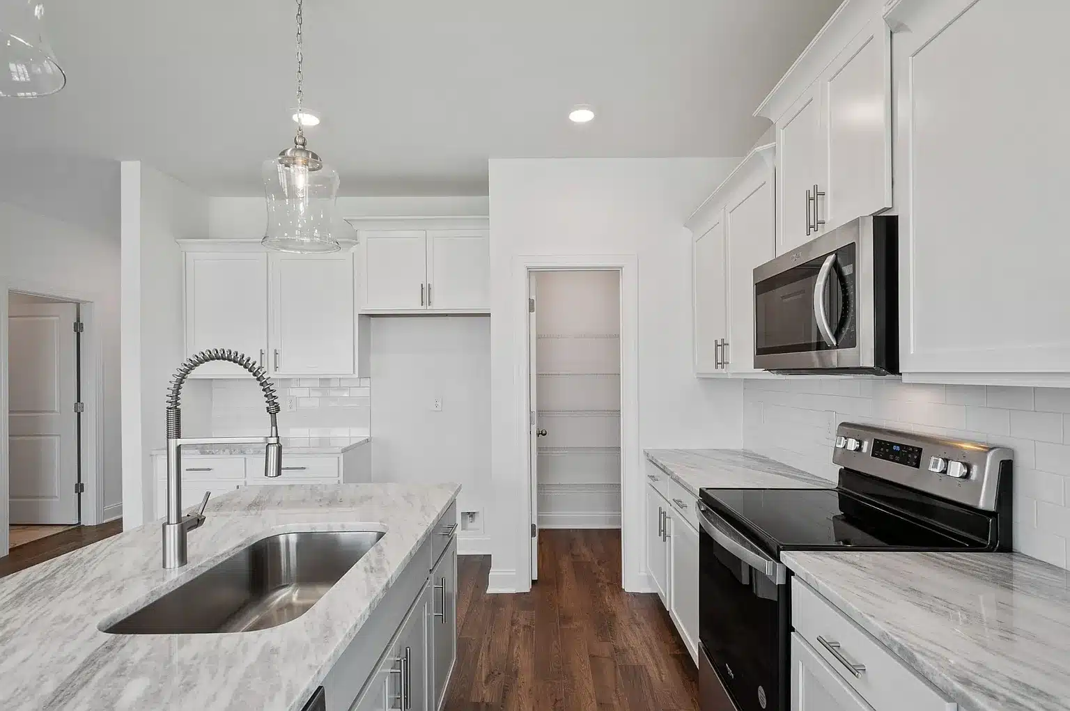 A kitchen area in the holston home series by patterson company