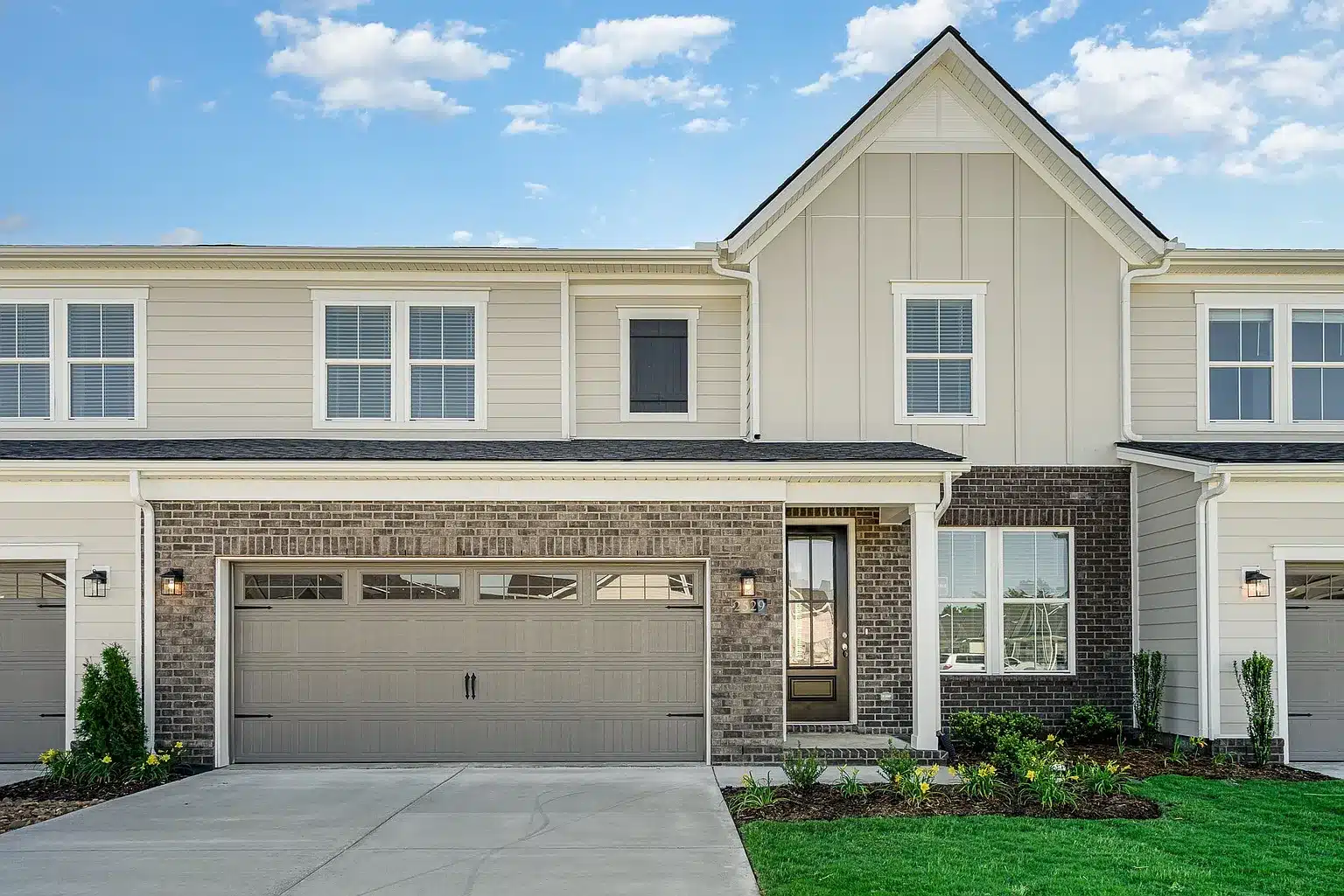 A lexington garage and home front in a patterson company built home