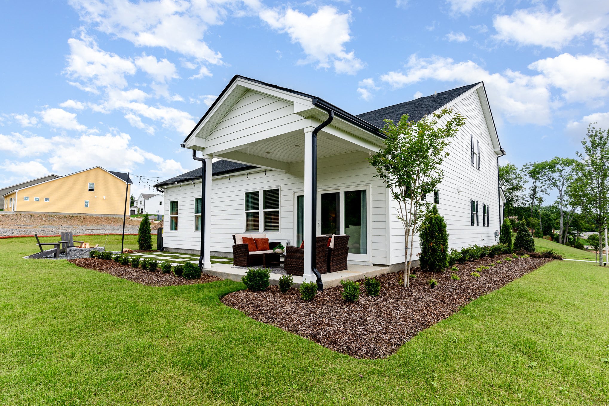 A backyard patio area in a home built by patterson company