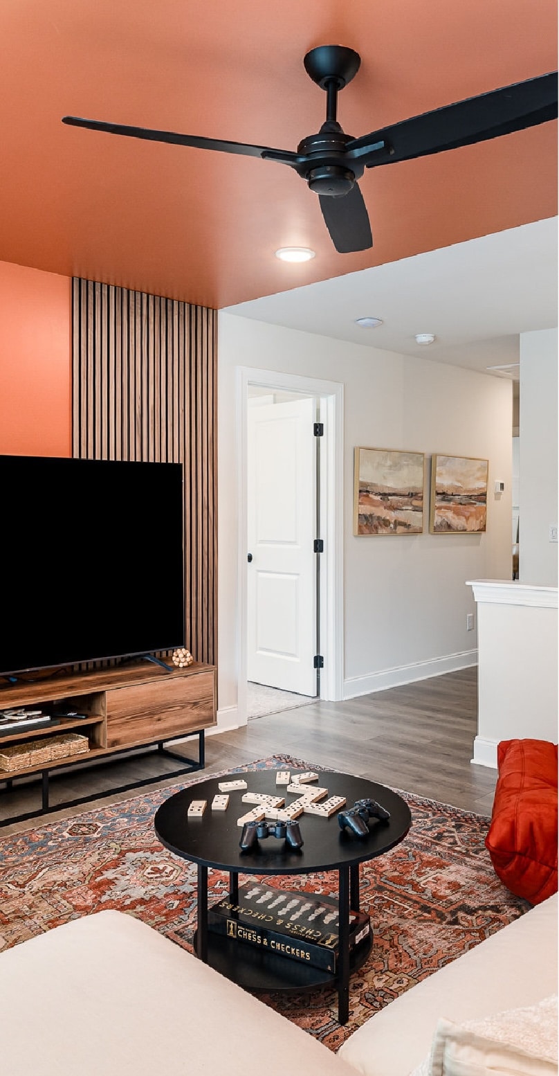 A living room painted orange