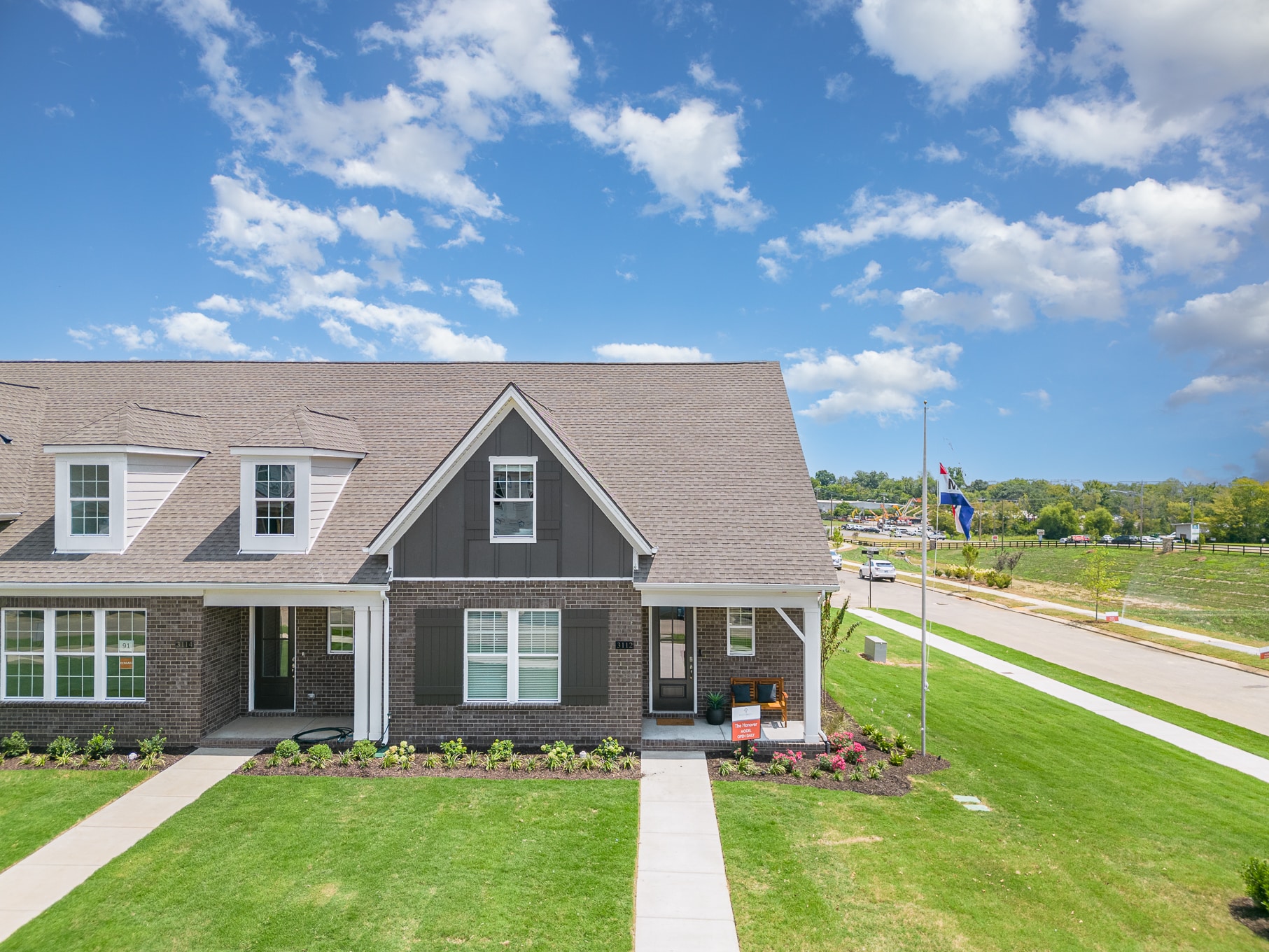 Home front of the Hanover series model home by Patterson Company