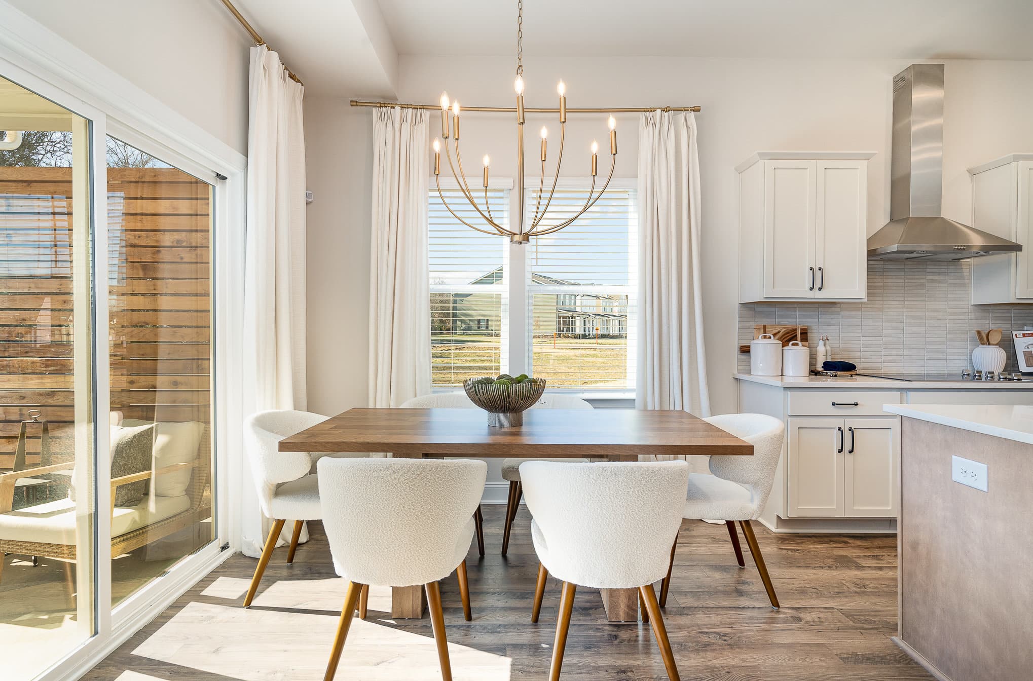 A dining table in the cambridge series home by patterson company