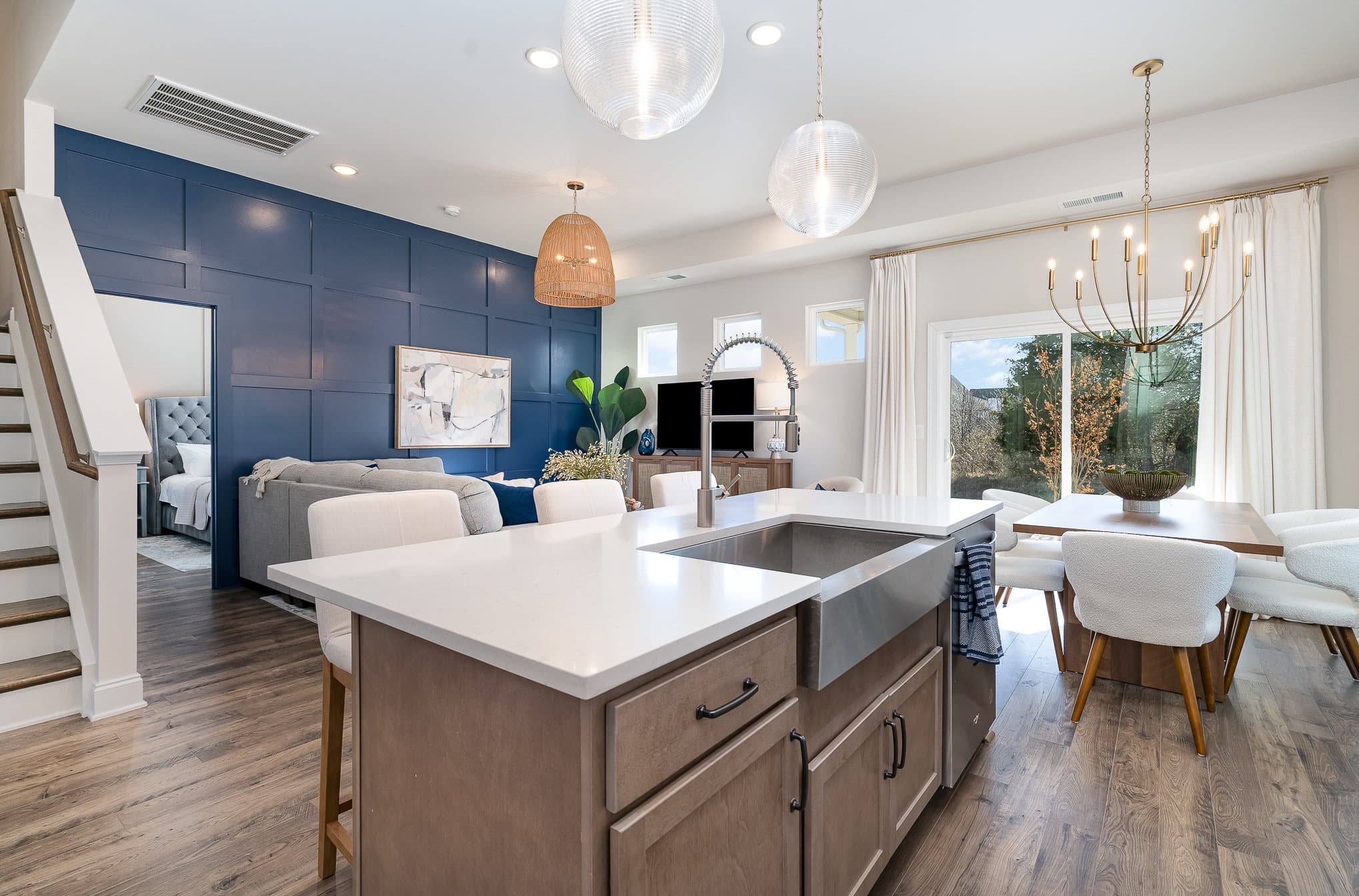 A kitchen island in the cambridge series home by patterson company