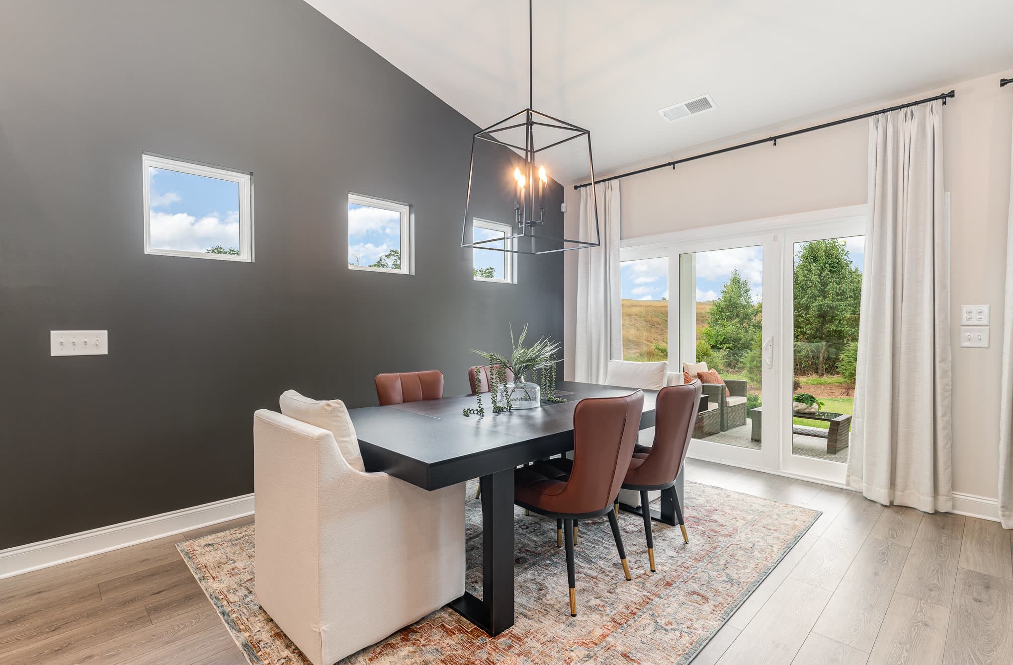 A dining area in a Harpeth series home by Patterson Company