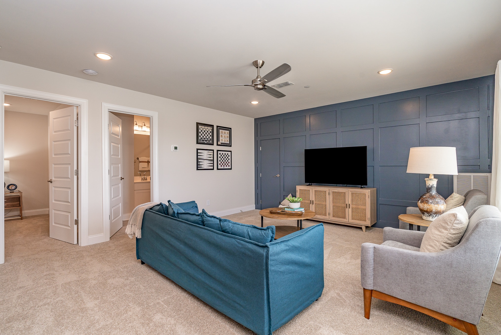 An upstairs living area in the Hanover series model home by Patterson Company
