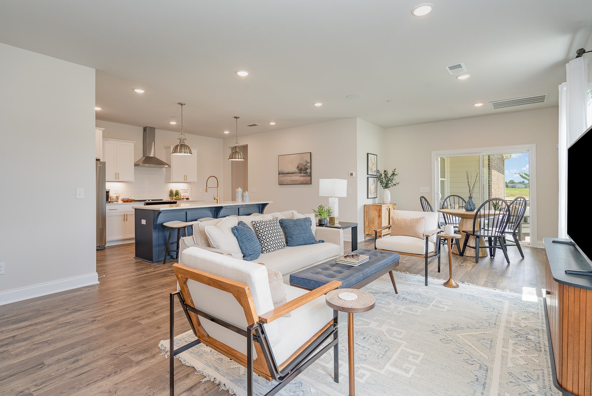 A couch in the Hanover series model home by Patterson Company