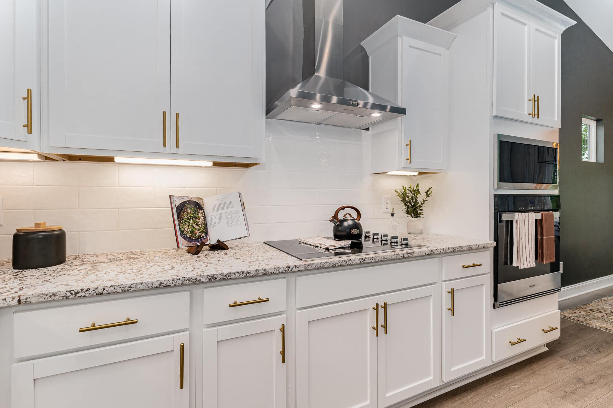 A stove top in a Harpeth series home by Patterson Company