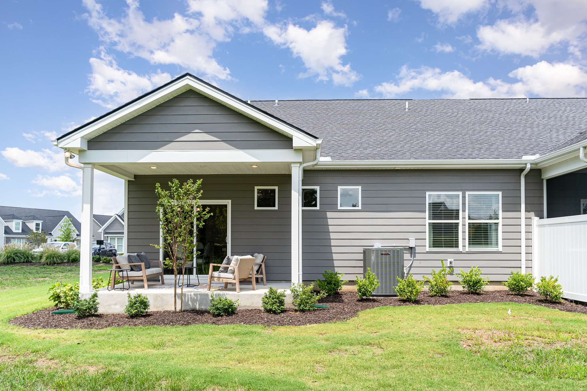 A backyard area in the cambridge series home by patterson company