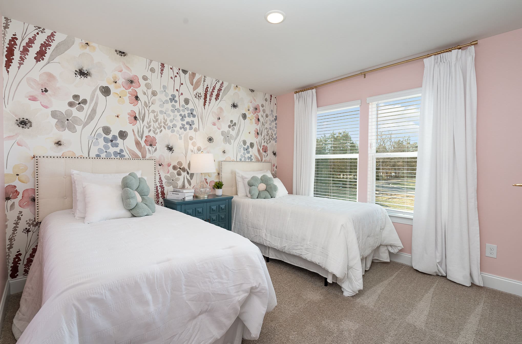 A bedroom for kids in the cambridge series home by patterson company