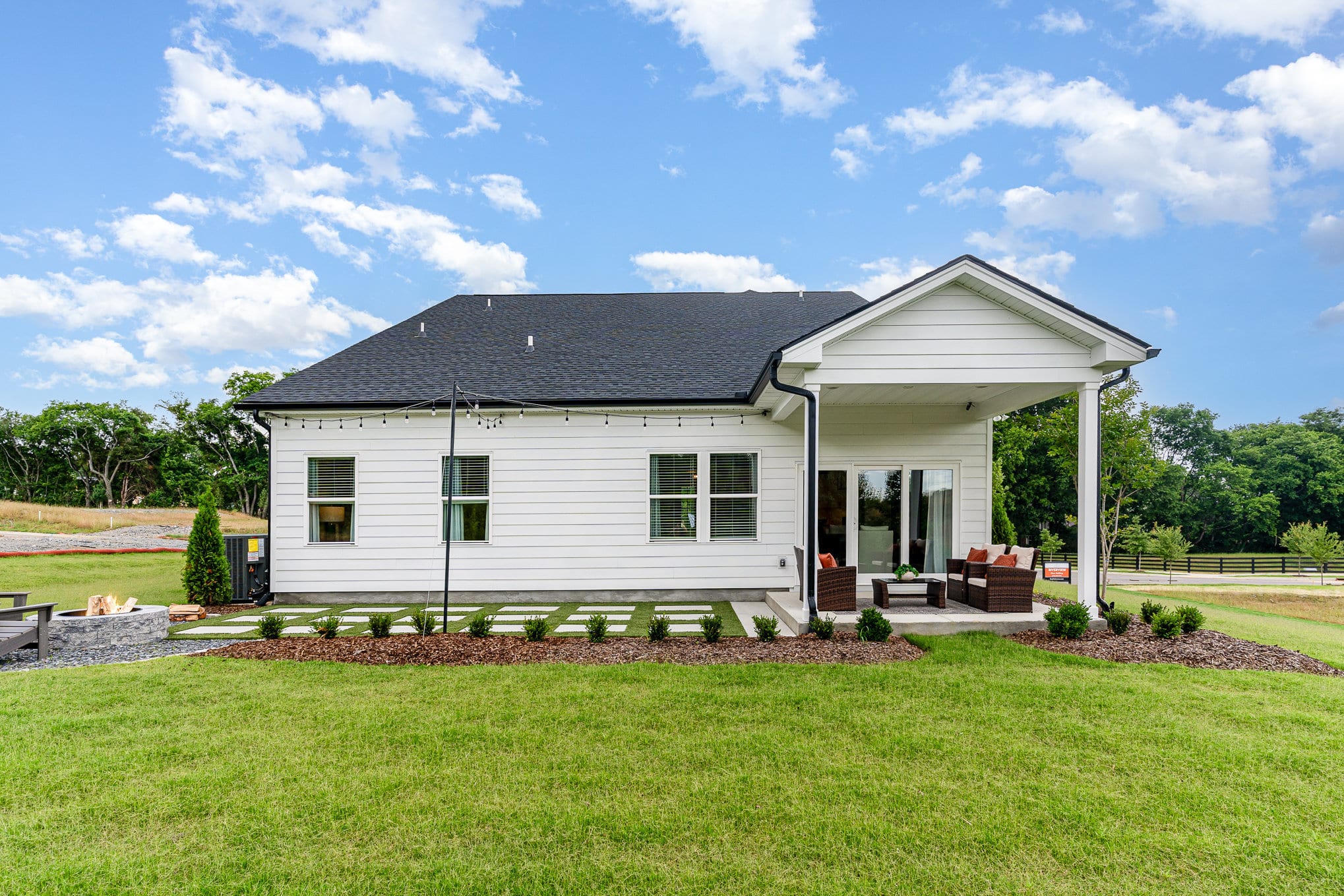 The backyard area at a harpeth series home by patterson company